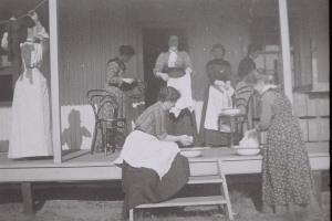 Photograph of the teachers doing laundry at Merebank Camp.